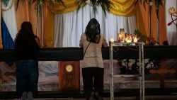 People at prayer in a church in Nicaragua