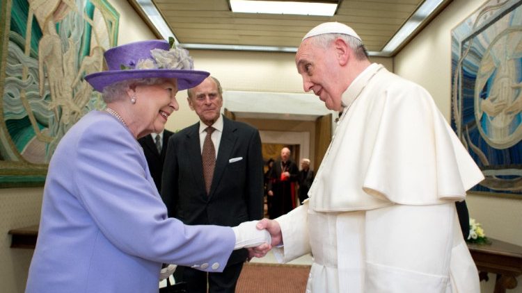 Pope Francis shakes hands with Queen Elizabeth II on 3 April 2014, with Prince Philip present