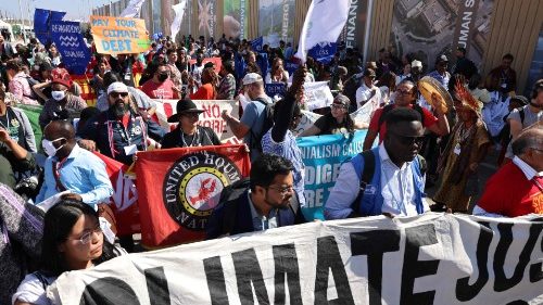 Climate activists hold a protest in Sharm el-Sheikh