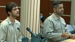 An image grab from Iranian State TV of Mohammad Mahdi Karami and Seyyed Mohammad Hosseini attending a court hearing before being executed