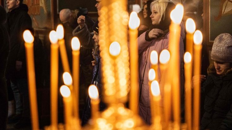 The faithful participate in an Orthodox Christmas service in Kyiv