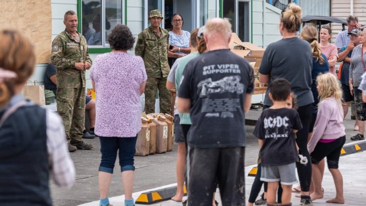 Army personnel delivering aid to a stranded community near Napier, New Zealand