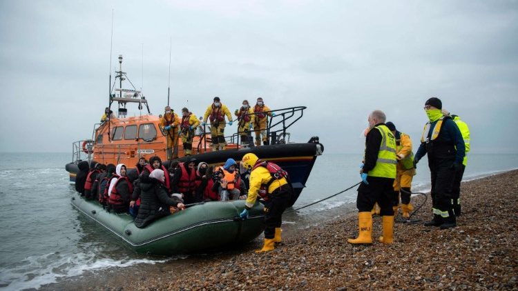 File photo of migrants arriving at a beach on the south-east coast of England after being rescued in the English Channel