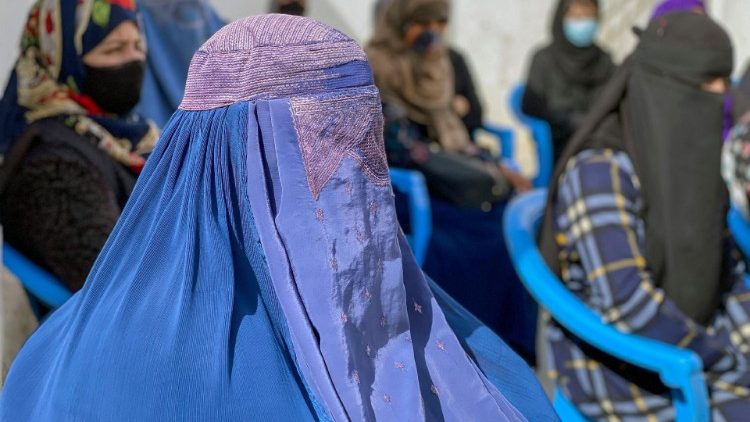 Afghan women gather to protest their right to education in a house in Mazar-i-Sharif