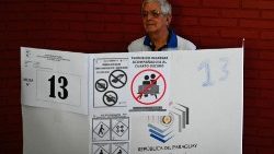 A man casts his vote during national elections in Asuncion