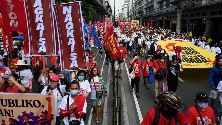 Demonstrators take part in a Labor Day rally in Manila on 1 May 2023.