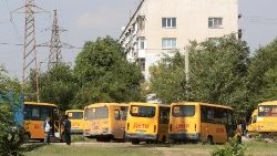 Buses stand ready to evacuate civilians near Simferopol on the Crimean peninsula 