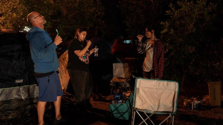 Family members camping out in parking lot as they flee from McDougal Creek wildfire threats