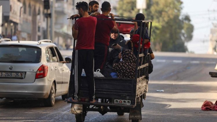 Palestinians flee to safer areas in Gaza after Israeli air strikes