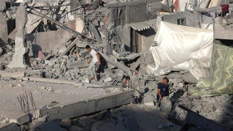 Destroyed buildings in the Nuseirat refugee camp in the central Gaza Strip