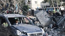 A man drives a damaged car through a street ravaged by Israeli bombing in Rafah in the southern Gaza Strip on November 2, 2023, as battles between Israel and the Palestinian Hamas movement continue