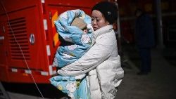 On the streets in sub-zero temperatures following the quake in Jishishan County in Gansu province