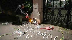 A tribute to Iranian explosion victims in front of an Iranian Embassy