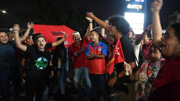 Supporters of the ruling Libertad y Refundacion party (LIBRE) celebrate in Tegucigalpa on March 8, 2024, after former Honduran President (2014-2022) Juan Orlando Hernandez was convicted of drug trafficking by a New York jury, in the United States.