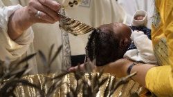 Pope Francis Baptizes newborns in Vatican
