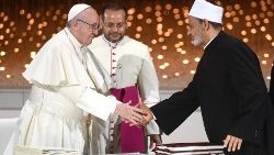 FILE: Pope Francis and Grand Imam of Al-Azhar, Ahmed el-Tayeb, shaking hands at the signing of the document on "Human Fraternity for World Peace and Living Together" in 2019.