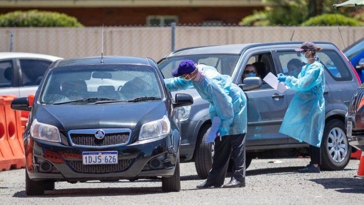 Medical staff at a Covid-19 drive-through testing site in Perth