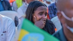 An Ethiopian woman weeps during an event marking the one-year anniversary of the war in Tigray on 3 November 2021