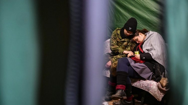 Refugiados ucranianos en la frontera con Polonia