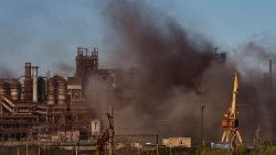 Smoke arises from the steel plant in Mariupol