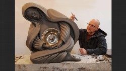 Sculptor Timothy Paul Schmalz at work on his new sculpture, the Life Monument