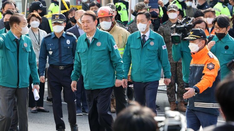 South Korean President Yoon Suk-yeol visits the site of Saturday's stampede