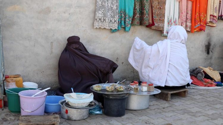 Afghan women at a market on the eve of International Women's Day