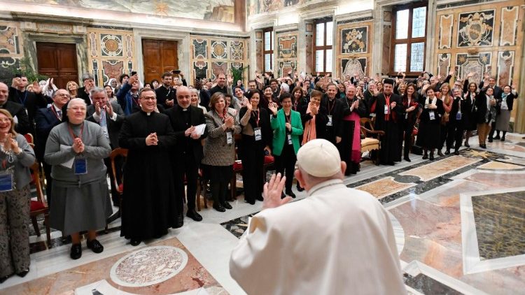 Pope Francis greets participants in the conference