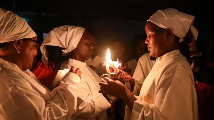 The faithful in Kenya attend Easter Vigil Mass at Queen of Apostles Catholic Church, on Holy Saturday, 