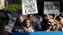 Climate activists march on Earth Day in Washington, DC