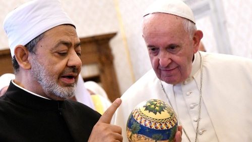 Pope Francis receives a gift from Grand Imam Ahmed Al-Tayeb during a visit to the Vatican, 15 November 2019
