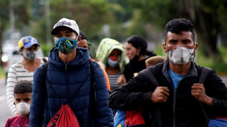Migrants walking toward the border between Venezuela and Colombia in October of last year.