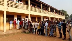 Against odds, voters queue to cast their ballots in Bangui, the capital.