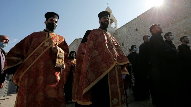 Orthodox clergy attend Christmas celebrations at the Church of the Nativity in Bethlehem