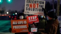Activists in opposition to the death penalty gather to protest the execution of Lisa Montgomery