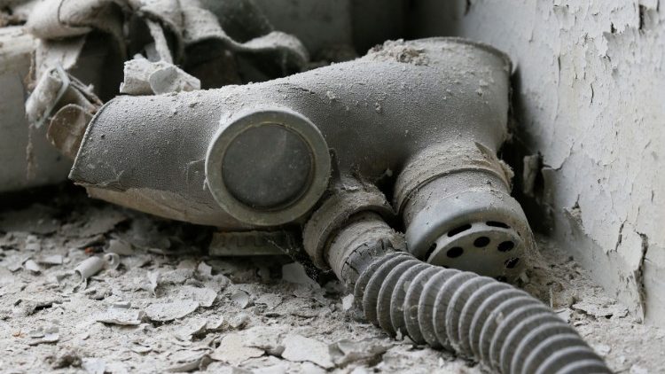 A child's gas mask lies in a former kindergarten classroom near the Chernobyl Nuclear Power Plant in Ukraine