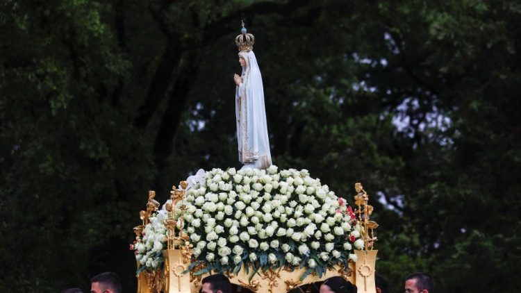 the statue of Our Lady of Fatima carried in procession at the Shrine dedicated to her in Portugal