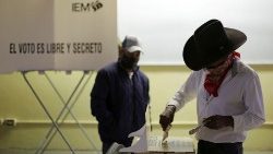 A man casts his vote at a polling station during the mid-term elections in Morelia, Mexico