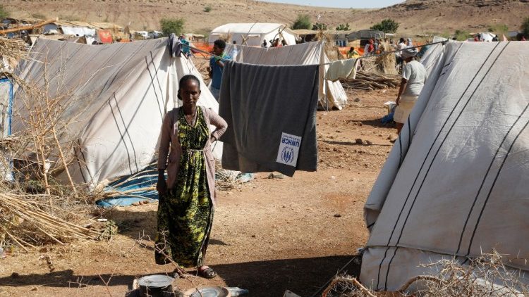 A lady is seen at a refugee camp housing Ethiopians fleeing the fighting in the Tigray region