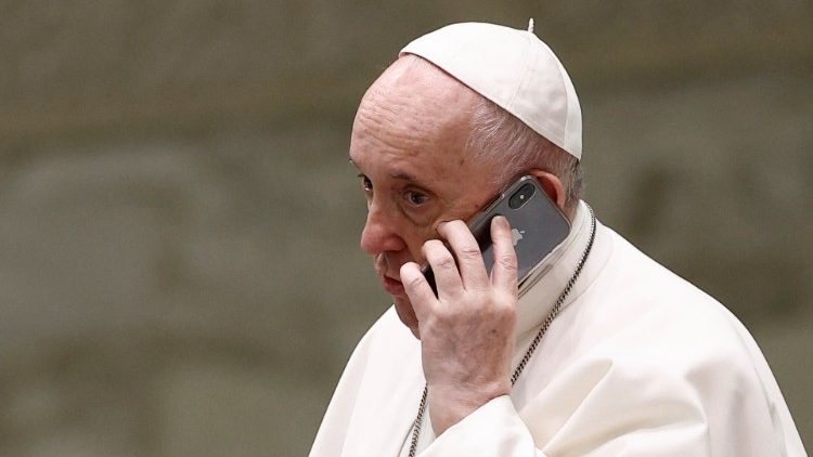 File photo of Pope Francis speaking on the phone