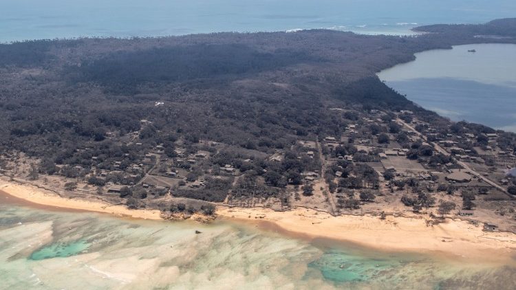 A general view from a New Zealand Defence Force P-3K2 Orion surveillance flight shows heavy ash fall over Nomuka in Tonga