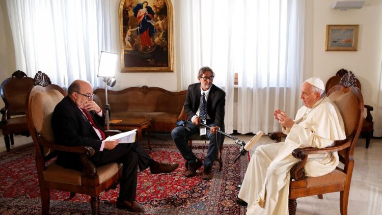Pope Francis speaks with Reuters Senior Correspondent Philip Pullella