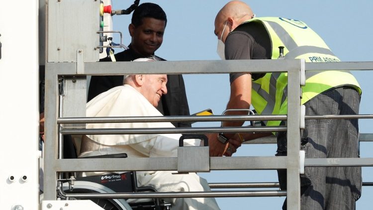 Pope Francis boards the papal plane