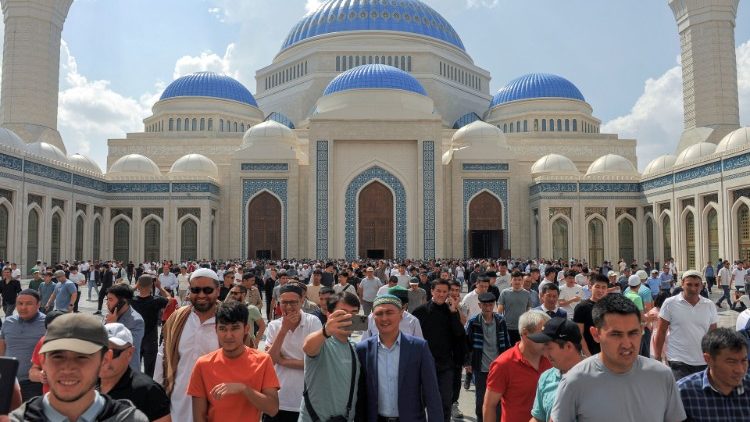 People visit a new mosque in Kazakhstan's capital of Nur-Sultan