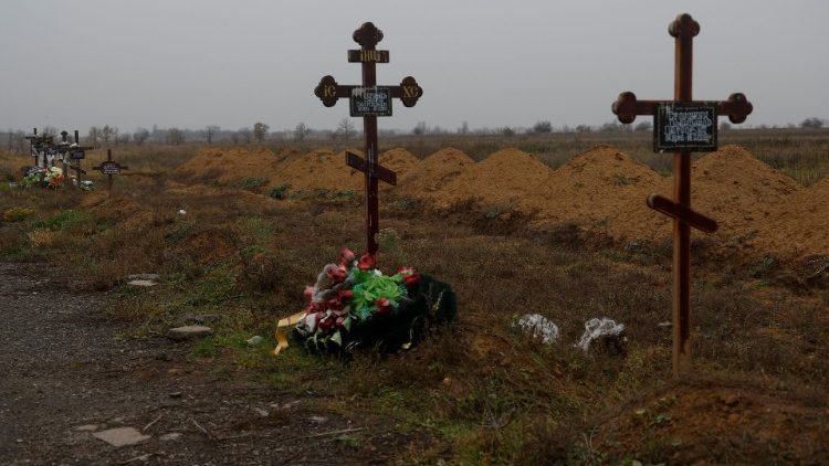 Graves of Ukrainian service member killed during the first day of  Russian full scale invasion of Ukraine