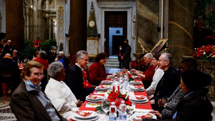 Cardinal Parolin (center R) at table with other guests