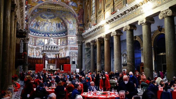The traditional Christmas lunch in Rome's Santa Maria in Trastevere Church (Reuters)