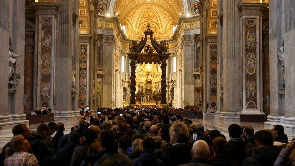 Faithful pay respects to former Pope Benedict in St. Peter's Basilica, at the Vatican