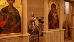 Chrzest 3-miesięcznego Timura, syna uchodźców z obwodu charkowskiego, w prawosławnym kościele w Buczy, 22 stycznia 2023