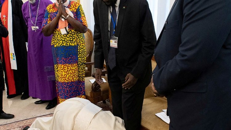 Pope kneels to kiss the feet of President of South Sudan at the end of a two-day spiritual retreat with South Sudan leaders at the Vatican in April 2019.